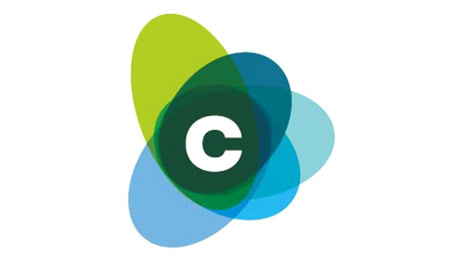 Multi-colored oblong abstract shapes revolving concentrically around a white letter c at center